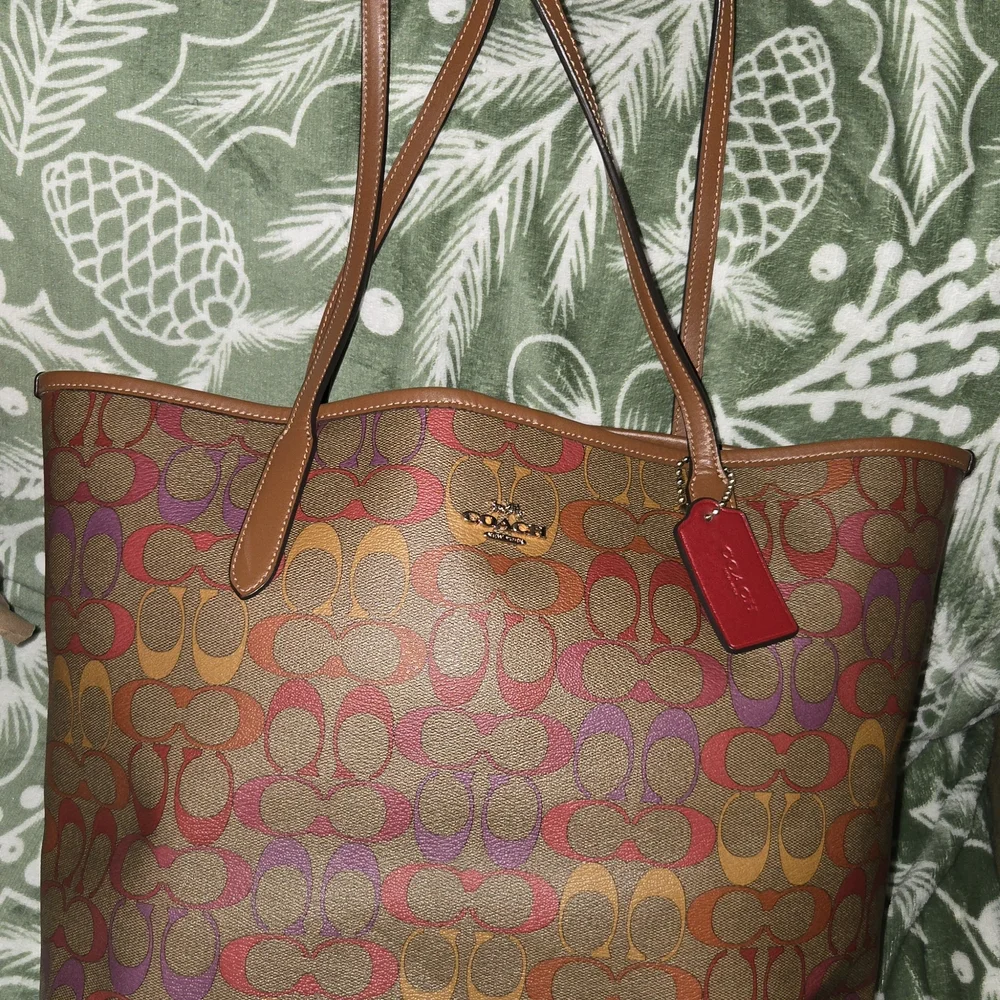 COACH SIGNATURE C CITY TOTE IN PINK, ORANGE, AND PURPLE WITH BROWN BACKGROUND - Picture 1 of 7